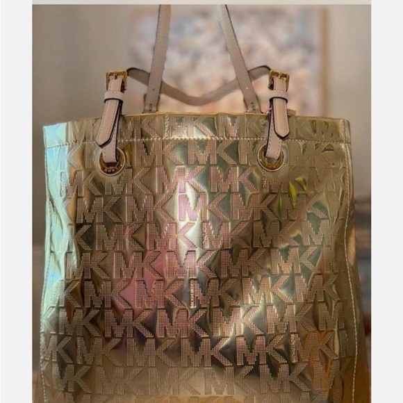 Michael Kors Women's Gold Metallic XL Tote Bag .
16” W x 11” T x 6.5” D - Picture 2 of 16